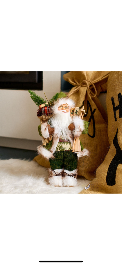 Figurine decorative pentru Craciun CLAUSE Mos Craciun gnom verde cu schiuri si sac 30 cm
