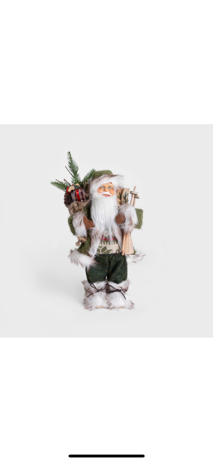 Figurine decorative pentru Craciun CLAUSE Mos Craciun gnom verde cu schiuri si sac 30 cm